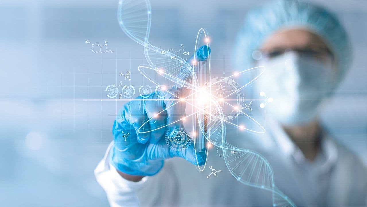 Ipopba/Stock.adobe.com – Conceptual image of scientist holding up a test tube with imagery of dna, an atom, and molecules surrounding it to illustrate the notion of "new" or "emerging" therapeutic/scientific concepts for drug development.