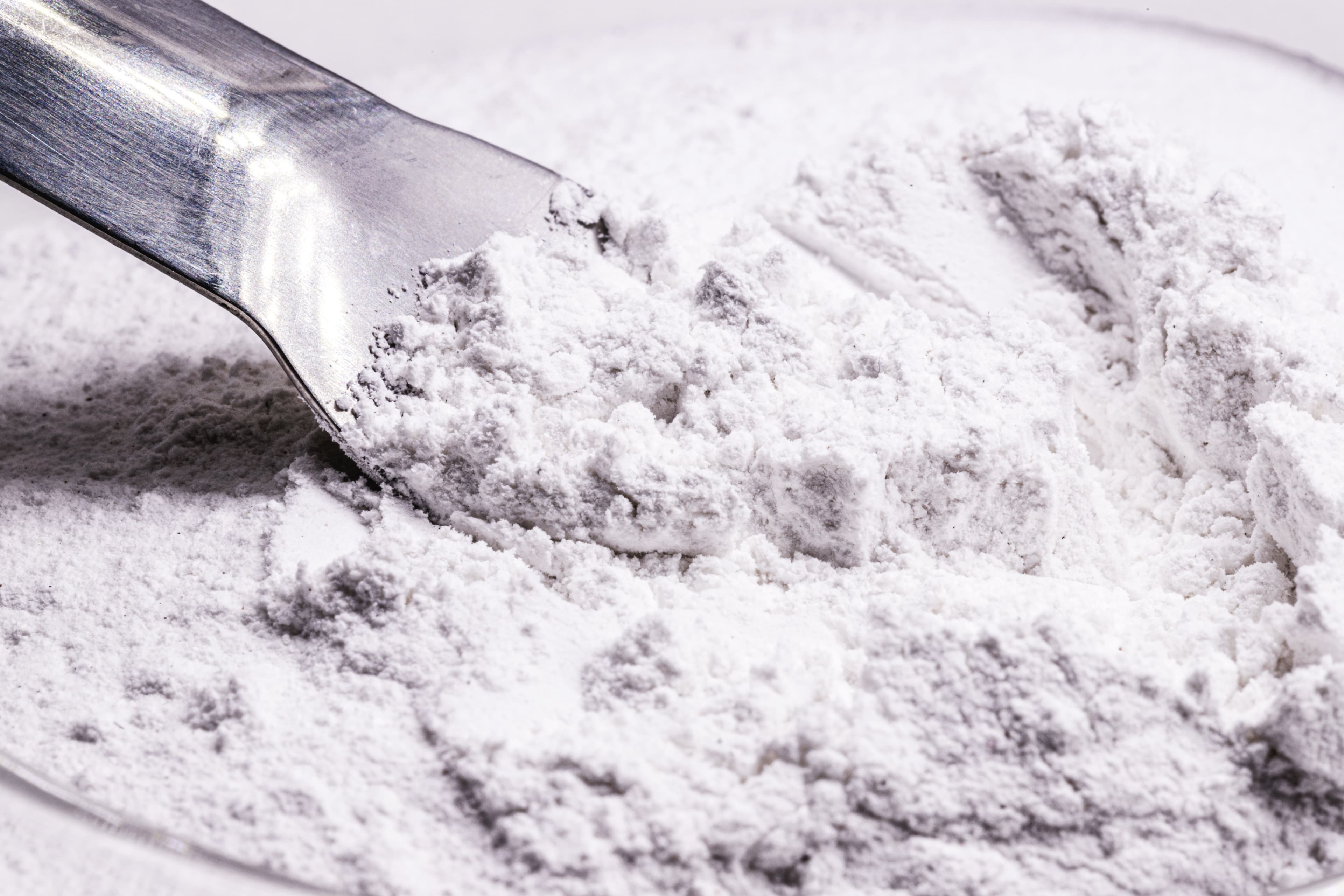 Benzoyl peroxide powder, chemical compound used in the preparation of cream, lotion or gel in the treatment of acne and mild to moderate forms of dermatitis. | Image Credit: © RHJ - stock.adobe.com