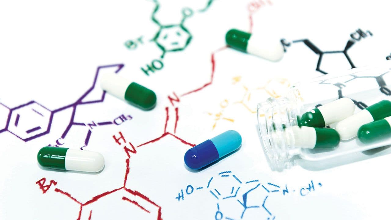 New chemical combination capsule drug on the colorful hand drawing chemical structure formula | Image Credit: ©HYUNGKEUN - stock.adobe.com