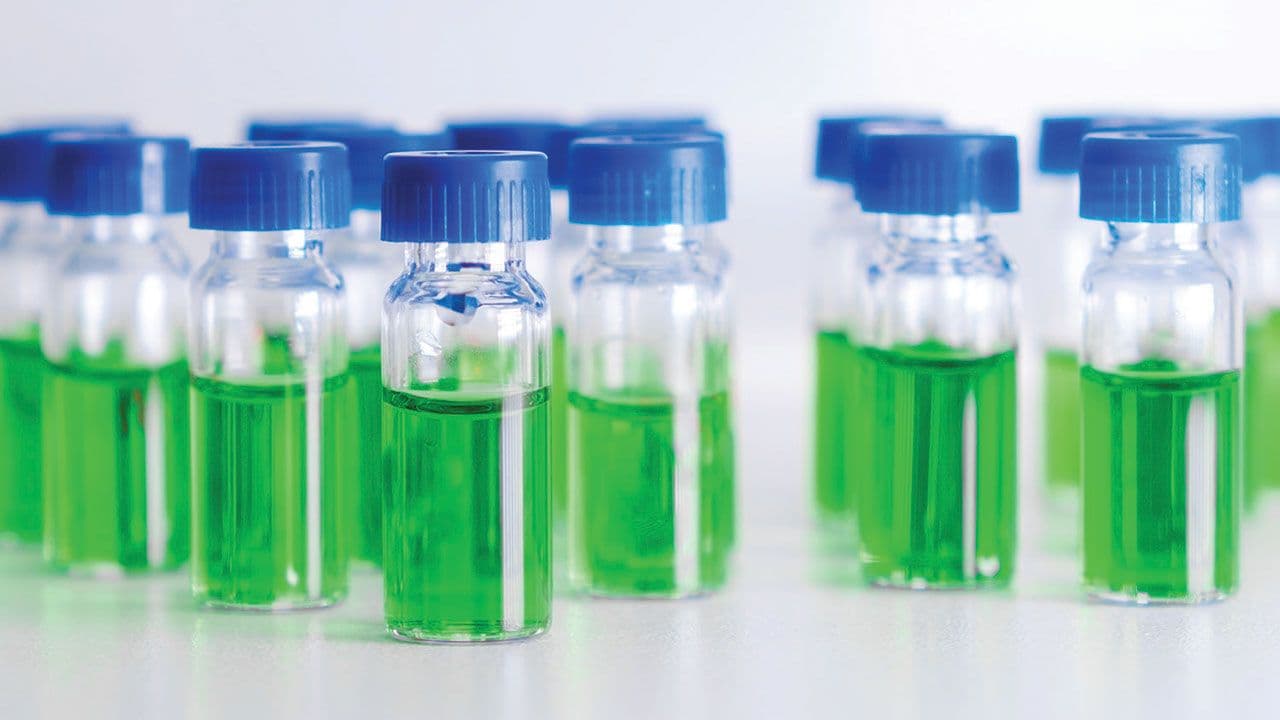 HPLC vials with green sample of plant extracts. Developing of drugs based on natural products. Biochemical analysis | Image Credit: ©vladim_ka - stock.adobe.com