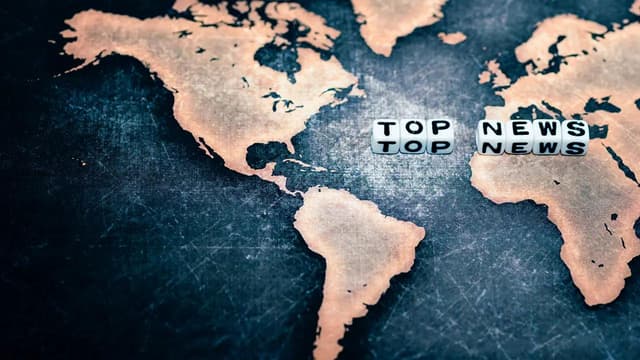 TOP NEWS on grunge world map | Image Credit: © Sean K - stock.adobe.com